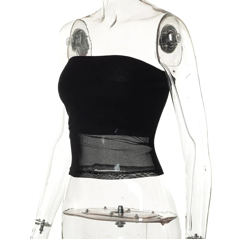 Black knit cropped top with patchwork details.
