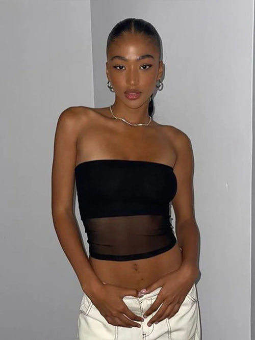 Black knit cropped top with patchwork details.