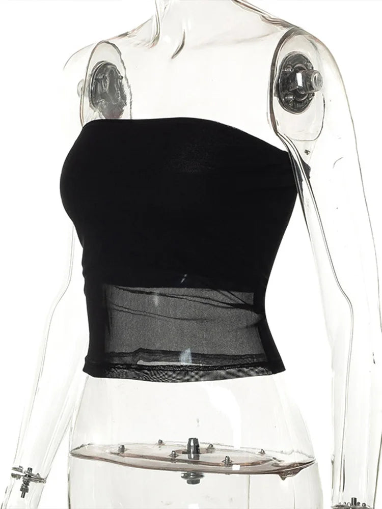 Black knit cropped top with patchwork details.